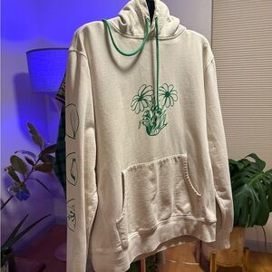 CHNGE Cream Hoodie with Green Floral Design